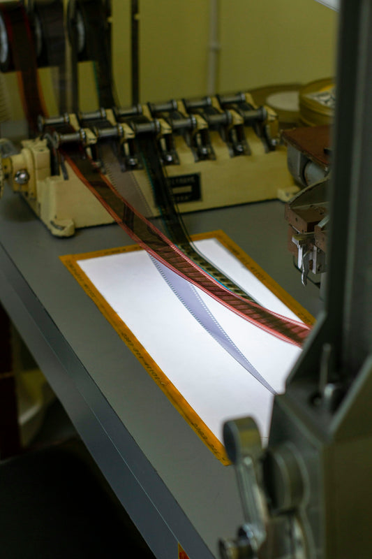 a machine that is cutting a piece of paper
