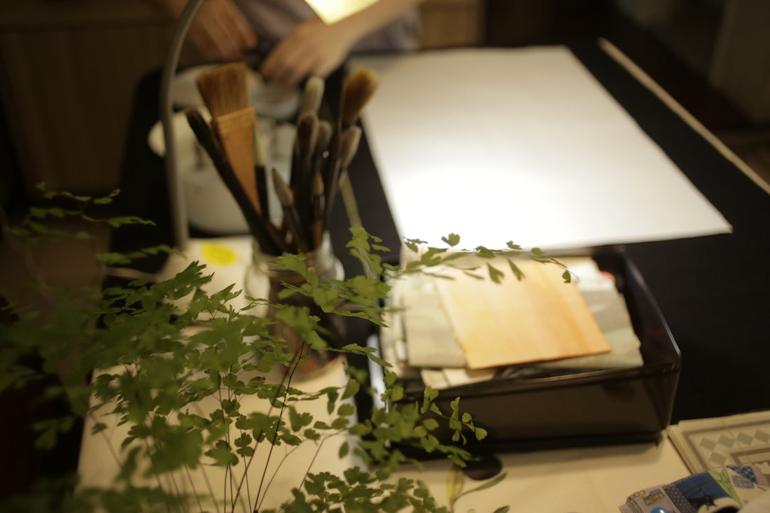 white printer paper on brown wooden table