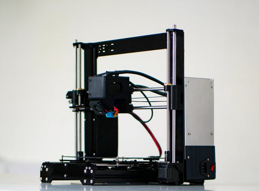 a 3d printer with wires attached to it