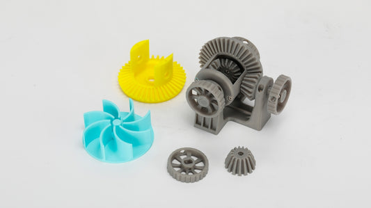 A plastic object with a yellow plastic object next to it