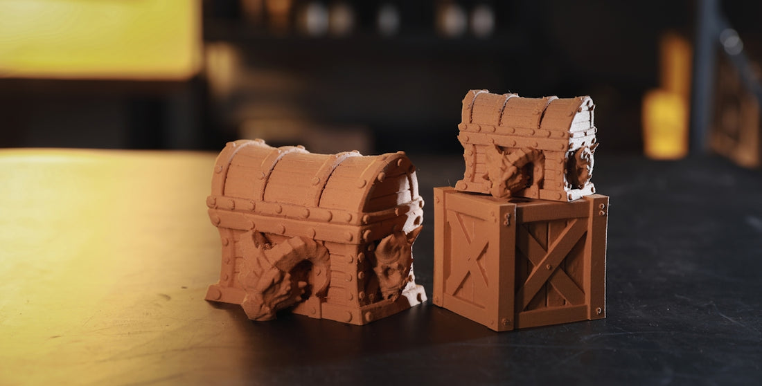 A close up of two pieces of clay on a table